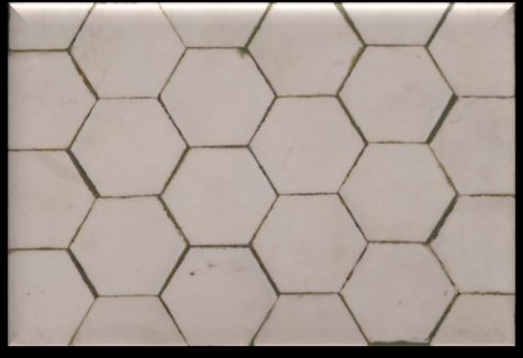 Hexagonal ceramic tiles and lining plates for chutes
